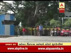 નવસારી-વેજલપુરને જોડતા રેલવે ફાટક પર ઓવરબ્રિજને અભાવે લોકોને હાલાકી, જુઓ વીડિયો