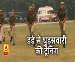 लाठी पर पुलिसकर्मियों की घुड़सवारी देखिए। ABP Ganga