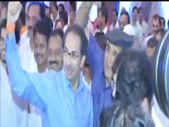 Sena chief Uddhav Thackeray flashes clenched fist at Mumbai's Grand Hyatt