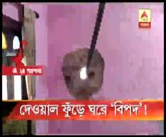 মধ্যমগ্রামে বিদ্যুতের তার পাতার সময় বাড়ির পাঁচিল, বৈঠকখানা, ছাদ ফুঁড়ে বেরিয়ে গেল মাটি খোঁড়ার যন্ত্র
