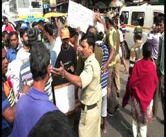 Reporter Stories: কাজের সময় বাড়ানোর প্রতিবাদে বিক্ষোভ বরানগর পুরসভার কর্মীদের