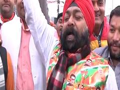 पीएम मोदी की फोटी लगी भगवा जैकेट पहनकर Ramlila Maidan पहुंचे लोग