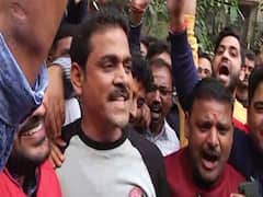 JMM supporters begin celebration at Jamshedpur Co-operative College