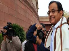 Chidambaram reaches parliament, stages protest against onion price rise