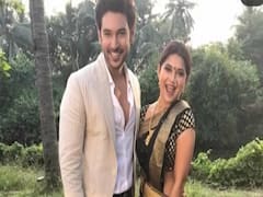 Jennifer Winget posing with Shivin Narang