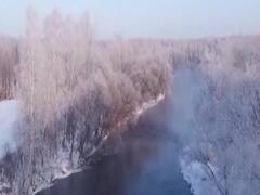 बर्फबारी से निखरी चीन की खूबसूरती, देखिए