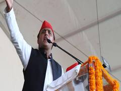Akhilesh Yadav sits on a 'dharna' outside Vidhan Sabha in protest against Unnao case