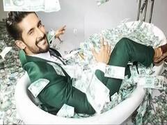 Ravi Dubey bathing in a pool of money