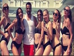 Ronit Roy posts a photo of him surrounded by women in bikini