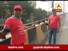 અમદાવાદઃ પતંગની દોરીથી લોકોને ઇજા ન થાય તે માટે બ્રિજ પર લગાવાયા તાર, જુઓ વીડિયો