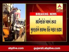 દાહોદઃ માણેકચોક ખાતે ખાનગી બસ ખાડામાં ફસાઇ, જુઓ વીડિયો