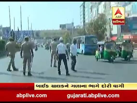 સુરત: કાતિલ દોરીથી લોકોના જીવ બચાવવા પોલીસ ઉતરી રસ્તા પર, જુઓ વીડિયો