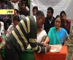 সিএএ বিরোধিতায় কালো ছাতা নিয়ে মিছিল তৃণমূলের, পাল্টা সই সংগ্রহ বিজেপির