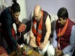 Amit Shah, Manoj Tiwari have meal at Delhi BJP worker's residence