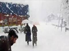 J&K: Heavy snowfall brings normal life to a standstill