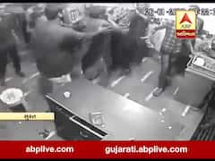 સુરતઃ નશામાં ધૂમ યુવકે દુકાનદાર સાથે કરી મારામારી, જુઓ સીસીટીવી