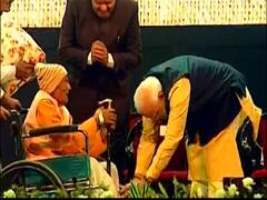 PM Modi touches feet of elderly pensioners during Kolkata Port Trust's 150th anniversary celebrations