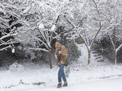 Heavy snowfall brings woe to residents of America