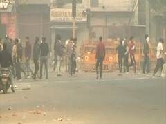 Delhi violence: Two cars set ablaze in Maujpur