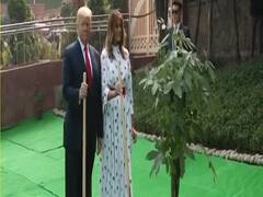 US President Donald Trump & Melania plant tree at Raj Ghat