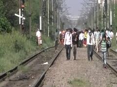 People traveling on bus tops from Ghaziabad's Lalkuan