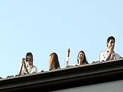 Bachchan family gathers on roof to thank 