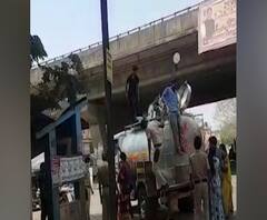 गावी परतण्यासाठी पालघरमध्ये दुधाच्या टॅंकरमधून जीवघेणी वाहतूक महिला आणि लहानग्यांचाही समावेश