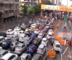 Maharashtra Lock Down | महाराष्ट्र लॉकडाऊन तरीही मुलुंड टोलनाक्यावर वाहनांच्या रांगा