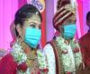 Coronavirus effect on marriage | कोरोना व्हायरसची खबरदारी घेत जोडपं अडकलं रेशीमगाठीत