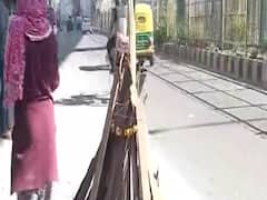 Delhi: Holi preps underway in violence-hit Maujpur