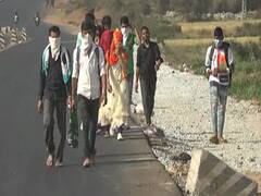 કોરોનાનો કહેરઃ અરવલ્લીથી રાજસ્થાન જઈ રહ્યા છે કામદારો, વાહન ન મળતાં પગપાળા ચાલતી પકડી