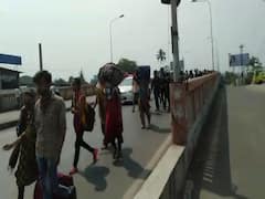 ગુજરાત લોકડાઉનઃ દક્ષિણ ગુજરાતથી શ્રમિકોએ પકડી વતનની વાટ, પગપાળા જવા મજબૂર, જુઓ વીડિયો