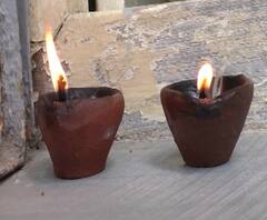 Superstitions on Corona | दिव्यांच्या प्रकाशात कोरोना पळून जातो! धुळ्यात अंधश्रद्धेचा बाजार!