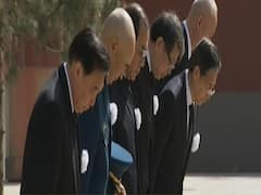 Watch: China Observes National Mourning Day For COVID-19 Victims
