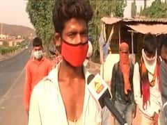 'सरकार कोई मदद नहीं कर रही, पुलिसवाले सिर्फ डंडे मार रहे हैं', मजदूरों का पलायन जारी | Lockdown-2