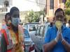 People at various places shower flowers on sanitation workers, police personnel