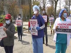 US: COVID-19 related fatalities surge past 30,000