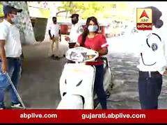 વલસાડમાં સ્કૂટી પર આવેલી યુવતીની દાદાગીરીઃ પોલીસને આપી ' ચાવડા સાહેબ 'ની ધમકી, જુઓ વીડિયો 