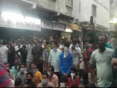 Surat में भी सैकड़ों मजदूर सड़कों पर निकले