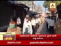 અરવલ્લી: મોડાસામાં પોલીસ અને નિવૃત આર્મી જવાનોની ફ્લેગમાર્ચ દરમિયાન પુષ્પવર્ષા, જુઓ વીડિયો