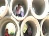 UP: Sewer pipes become temporary homes of MP migrants