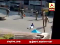 સુરતમાં કર્ફ્યૂમાં બહાર નીકળનારા યુવકોની જવાનોએ જમીન પર સૂવાડીને કરી બેફામ ધૂલાઈ, જુઓ વીડિયો