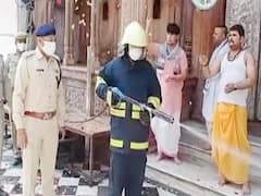 Banke Bihari Temple priests shower flowers over frontline workers