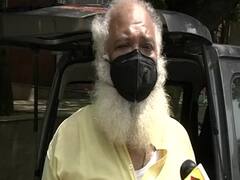 Priest of Bhairon temple distributes water to Corona warriors