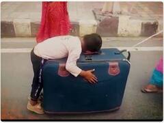 सूटकेस पर बच्चे वाले वीडियो पर आगरा डीएम का संवेदनहीन बयान