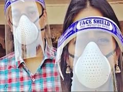 Mohena Kumari & husband wear face shield before shopping