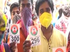 Vadodara: BJP leader's photo on migrant labour tokens triggers controversy