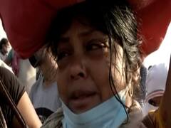 'हमारा आदमी मर गया है, बच्चे रो रहे हैं..हमें घर पहुंचा दीजिए'- बस के इंतजार में रोती-बिलखती महिला