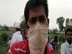 Haryana से Bihar पलायन कर रहे मजदूर पैदल पार कर रहे हैं यमुना नदी