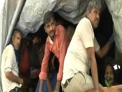 Ground Report: बिना जांच के ट्रकों में भर-भरकर यूपी पहुंच रहे हैं प्रवासी मजदूर